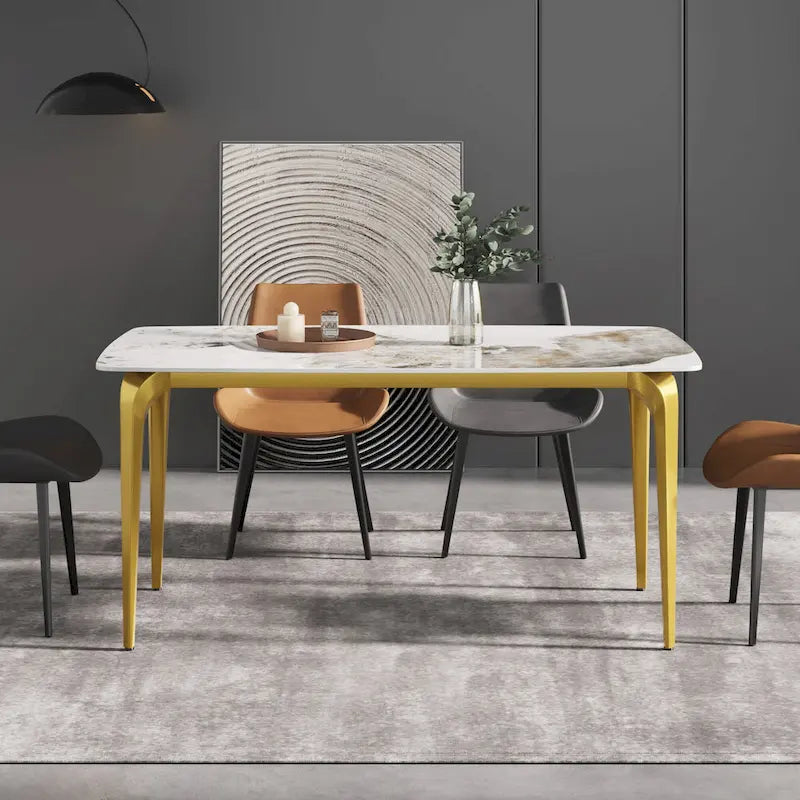 Table à manger moderne en ardoise, plateau en pierre frittée motif Pandora et pieds en métal.