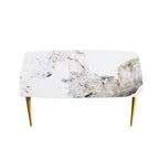 Table à manger moderne en ardoise, plateau en pierre frittée motif Pandora et pieds en métal.